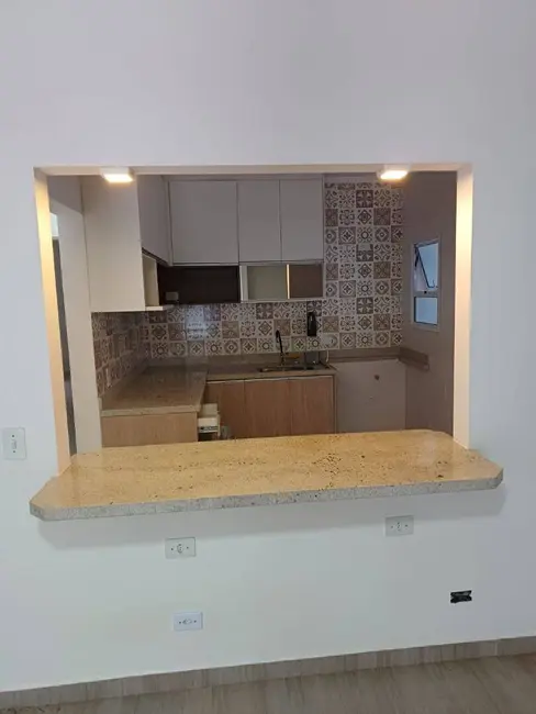Foto 3 de Apartamento com 2 quartos à venda, 83m2 em Cidade Jardim, Caraguatatuba - SP