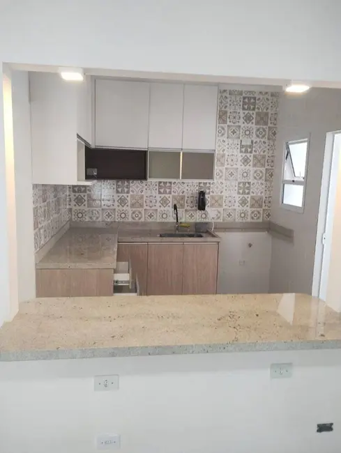 Foto 3 de Apartamento com 2 quartos à venda, 83m2 em Cidade Jardim, Caraguatatuba - SP