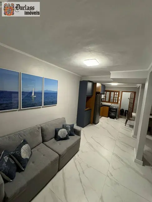 Sobrado com 2 quartos à venda, 64m2 em Martim de Sá, Caraguatatuba - SP - imagem 1 Foto 1 de Sobrado com 2 quartos à venda, 64m2 em Martim de Sá, Caraguatatuba - SP