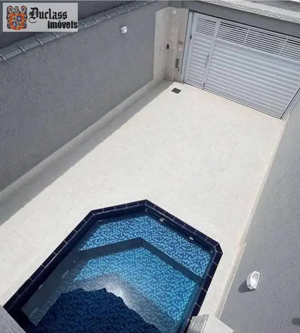 Foto 2 de Sobrado com 3 quartos à venda, 125m2 em Ocian, Praia Grande - SP