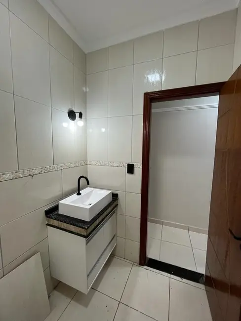 Foto 2 de Casa com 3 quartos à venda, 124m2 em Maracanã, Praia Grande - SP