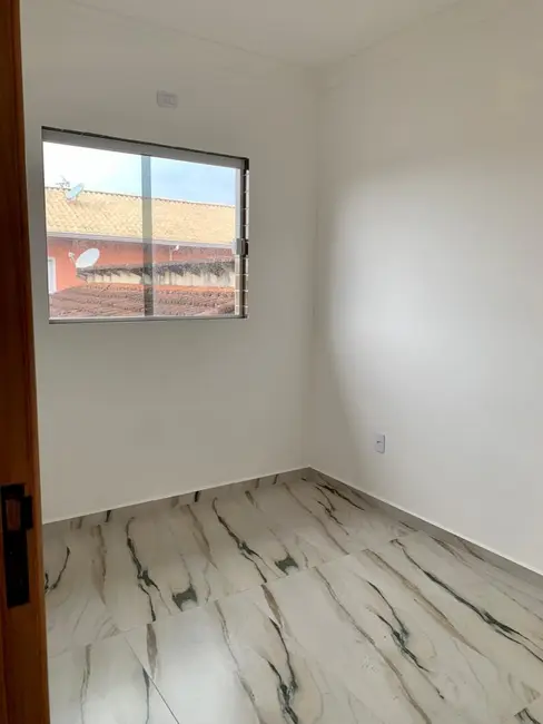 Foto 2 de Casa de Condomínio com 2 quartos à venda, 46m2 em Maracanã, Praia Grande - SP