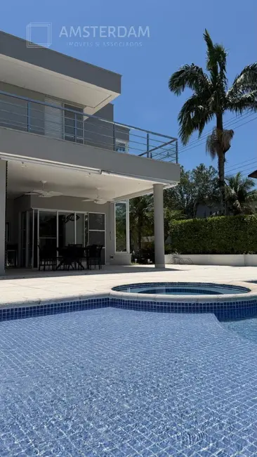 Casa de Condomínio com 5 quartos à venda, 385m2 em Bertioga - SP - imagem 2 Foto 2 de Casa de Condomínio com 5 quartos à venda, 385m2 em Bertioga - SP