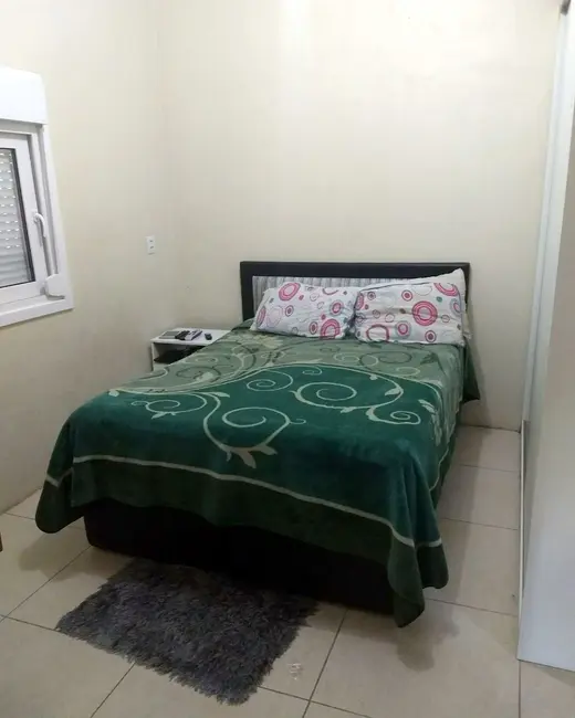 Casa com 2 quartos à venda, 111m2 em Rio Branco, Canoas - RS - imagem 6 Foto 6 de Casa com 2 quartos à venda, 111m2 em Rio Branco, Canoas - RS