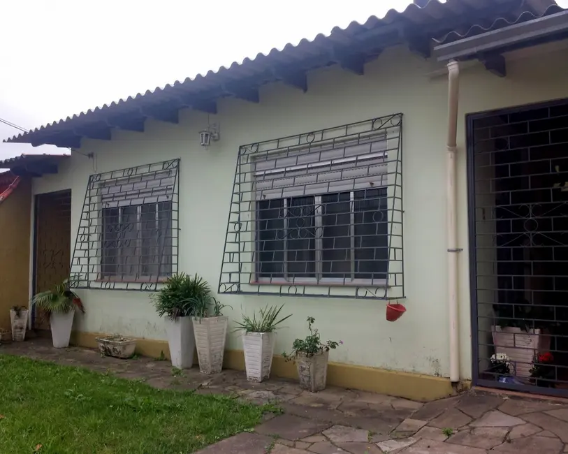 Foto 1 de Casa com 4 quartos à venda, 173m2 em Harmonia, Canoas - RS