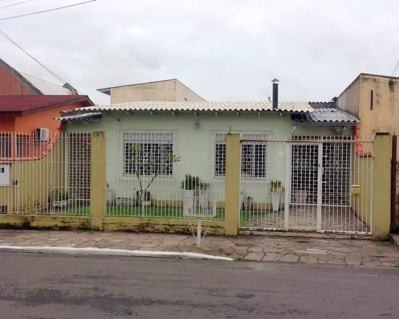Foto 2 de Casa com 4 quartos à venda, 173m2 em Harmonia, Canoas - RS