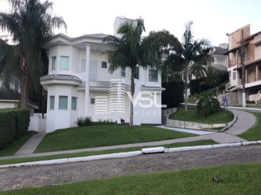 Foto 1 de Casa de Condomínio com 5 quartos à venda, 540m2 em Cacupé, Florianopolis - SC