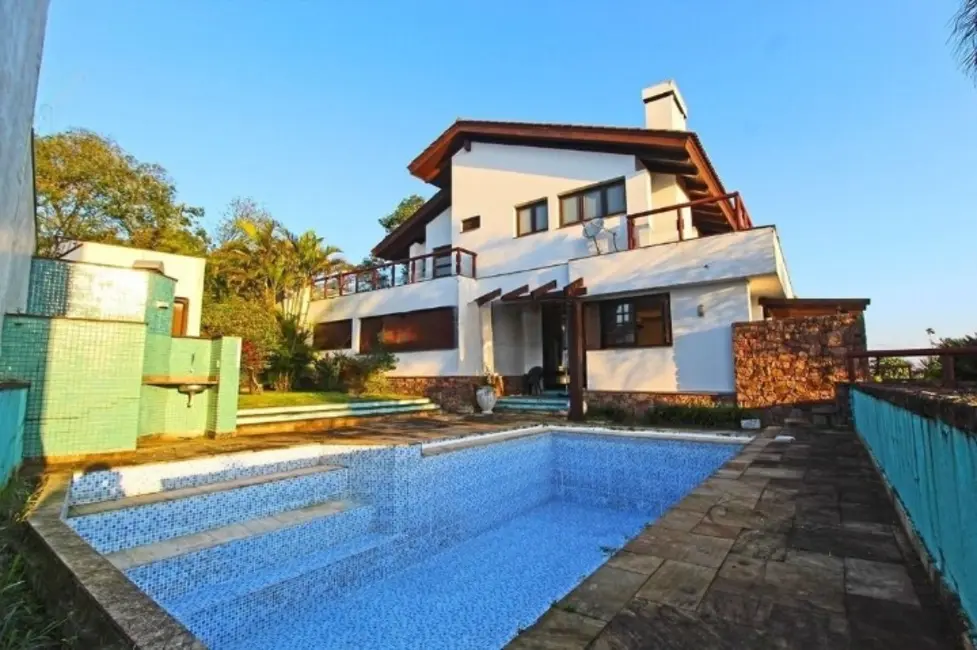 Foto 1 de Casa com 4 quartos à venda, 600m2 em Teresópolis, Porto Alegre - RS