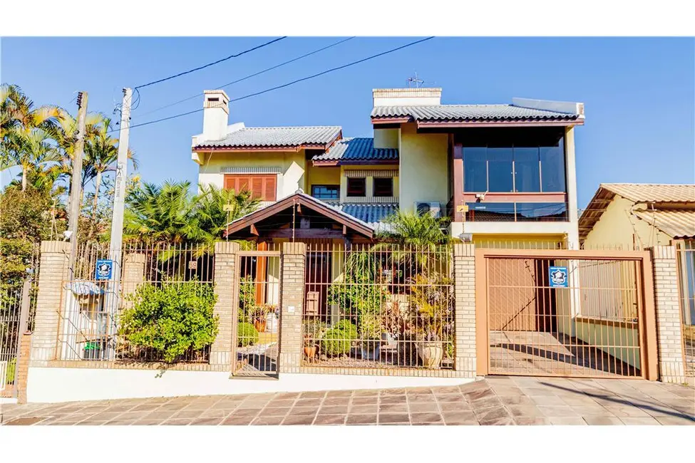 Casa com 4 quartos à venda, 306m2 em Jardim Lindóia, Porto Alegre - RS - imagem 2 Foto 2 de Casa com 4 quartos à venda, 306m2 em Jardim Lindóia, Porto Alegre - RS