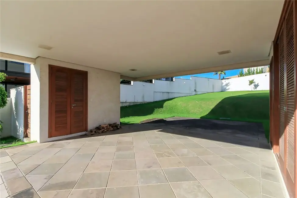 Foto 8 de Casa com 4 quartos à venda, 309m2 em Vila Nova, Porto Alegre - RS