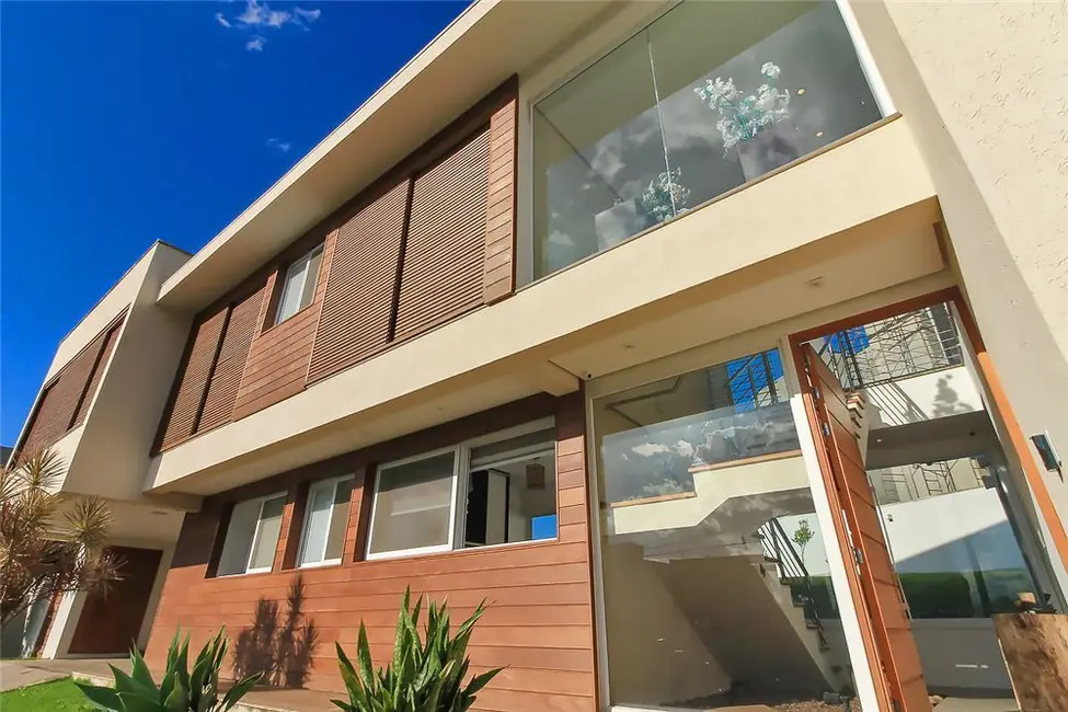 Foto 6 de Casa com 4 quartos à venda, 309m2 em Vila Nova, Porto Alegre - RS