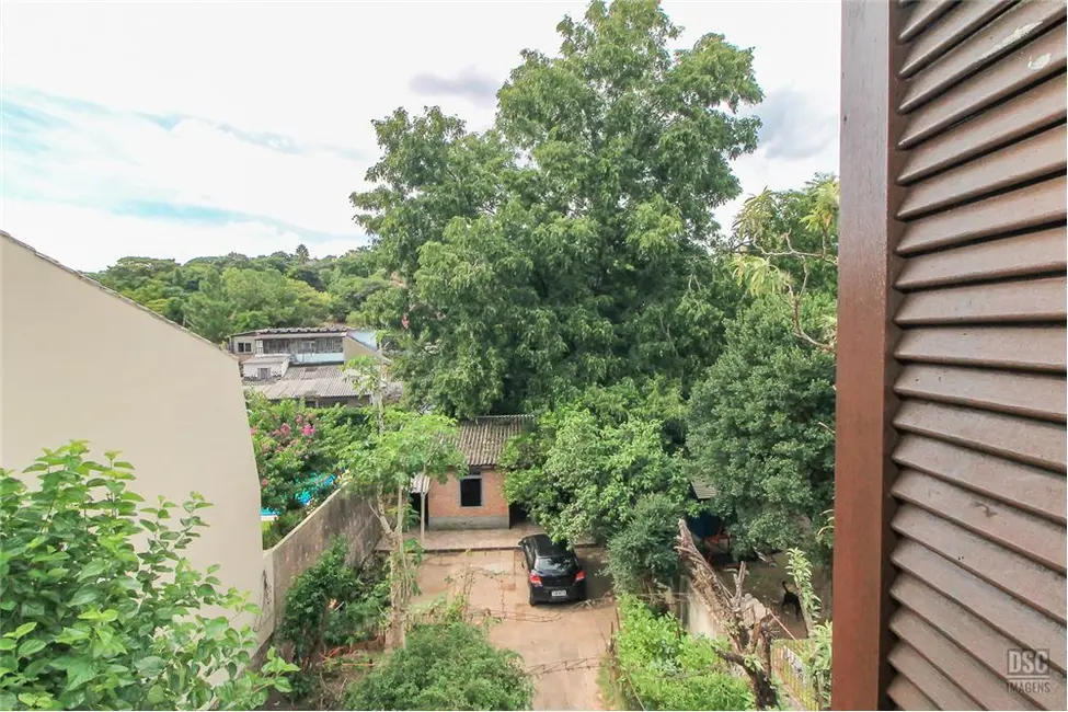 Foto 9 de Casa com 2 quartos à venda, 189m2 em Vila Nova, Porto Alegre - RS