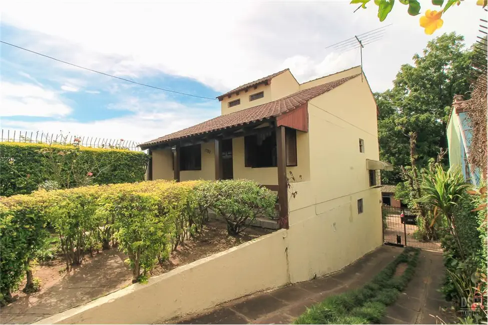 Foto 2 de Casa com 2 quartos à venda, 189m2 em Vila Nova, Porto Alegre - RS