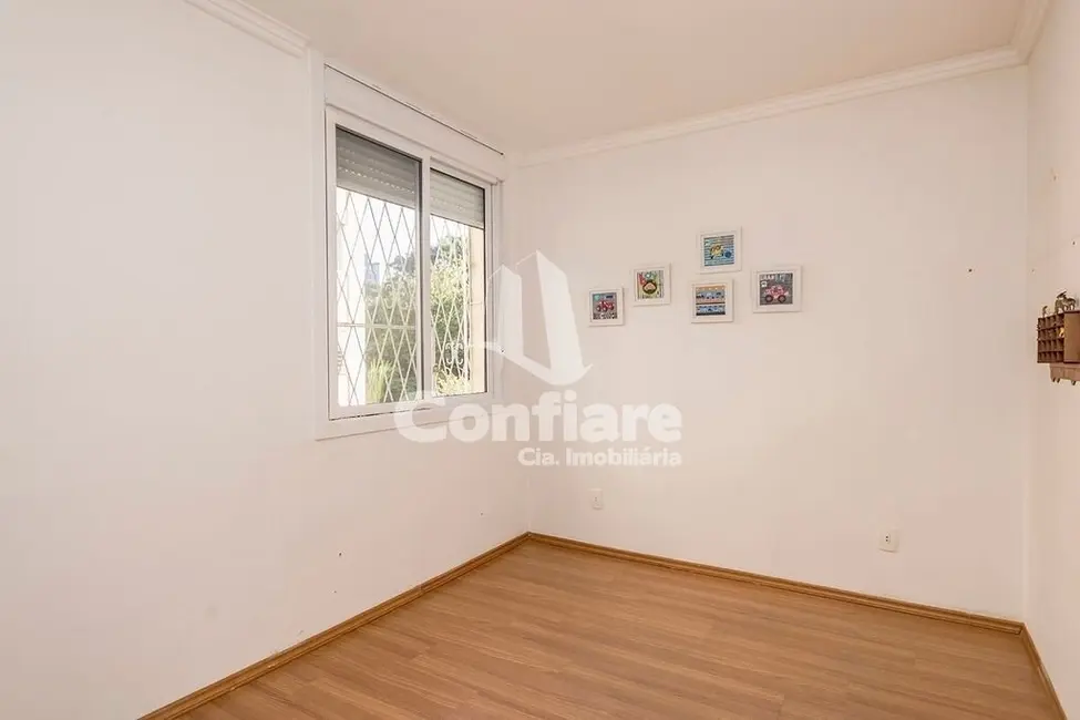 Apartamento com 3 quartos à venda, 60m2 em Santo Antônio, Porto Alegre - RS - imagem 6 Foto 6 de Apartamento com 3 quartos à venda, 60m2 em Santo Antônio, Porto Alegre - RS