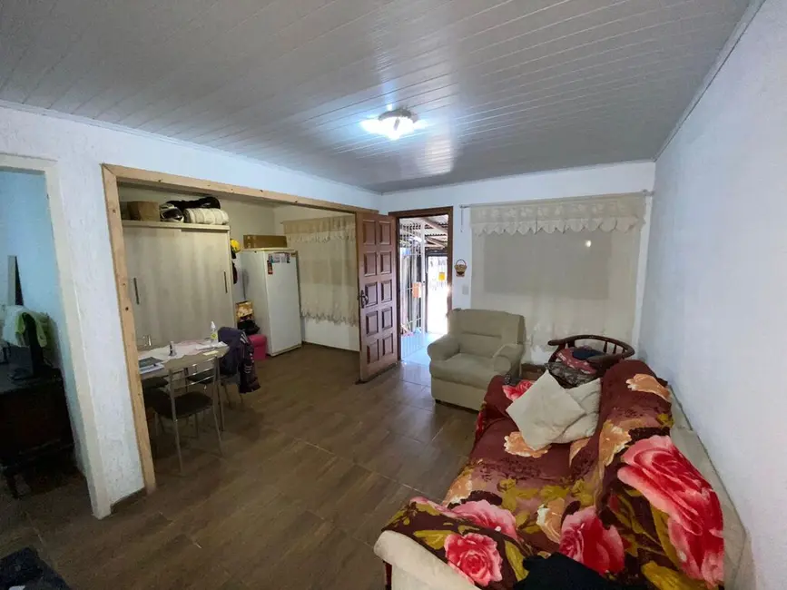 Casa com 2 quartos à venda, 60m2 em Costa e Silva, Porto Alegre - RS - imagem 1 Foto 1 de Casa com 2 quartos à venda, 60m2 em Costa e Silva, Porto Alegre - RS