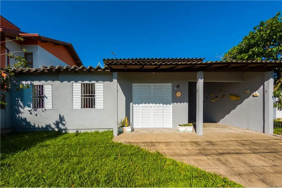 Foto 2 de Casa com 3 quartos à venda, 92m2 em Tramandai - RS