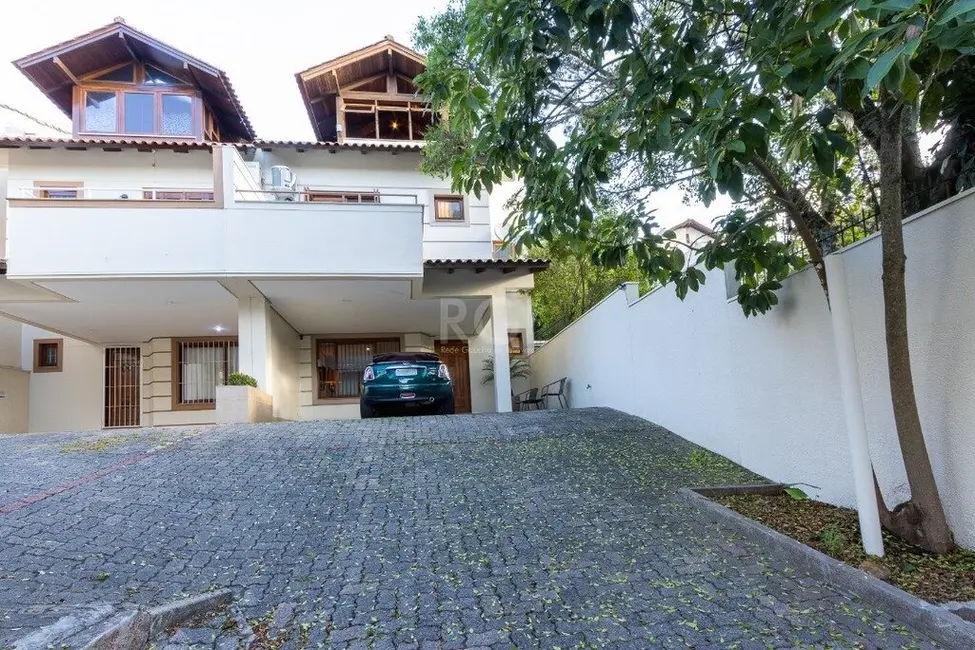 Foto 2 de Casa com 3 quartos à venda, 217m2 em Tristeza, Porto Alegre - RS
