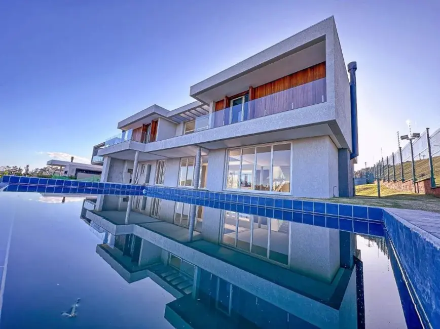 Foto 3 de Casa com 4 quartos à venda, 400m2 em Vila Nova, Porto Alegre - RS