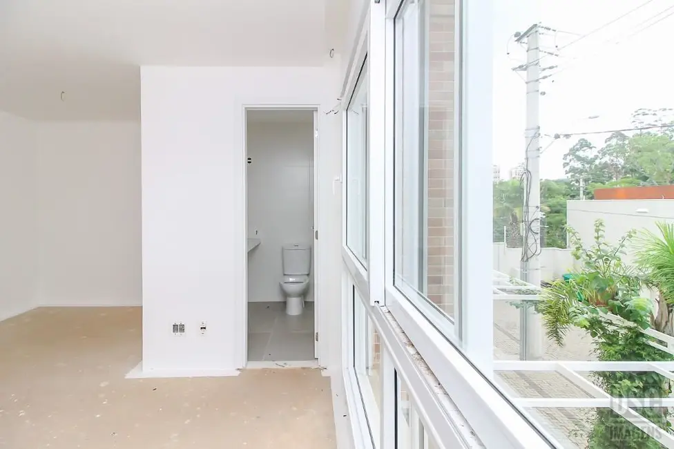 Foto 6 de Casa com 3 quartos à venda, 120m2 em Vila Nova, Porto Alegre - RS