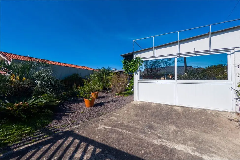 Casa com 3 quartos à venda, 122m2 em Centro, Tramandai - RS - imagem 4 Foto 4 de Casa com 3 quartos à venda, 122m2 em Centro, Tramandai - RS