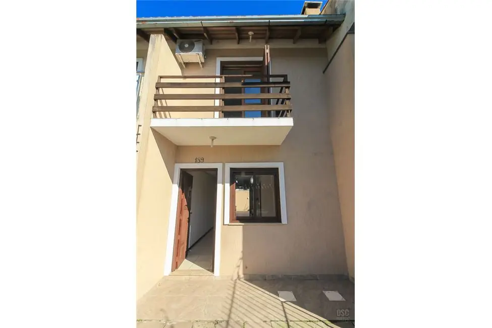 Foto 2 de Casa com 2 quartos à venda, 77m2 em Guarujá, Porto Alegre - RS