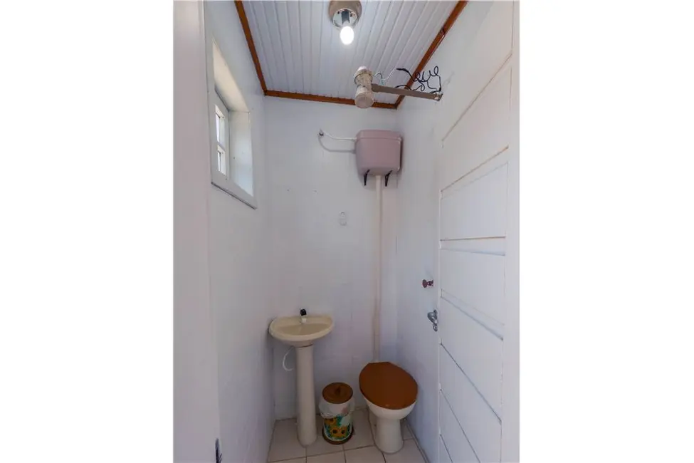 Foto 22 de Casa com 4 quartos à venda, 150m2 em Tramandai - RS