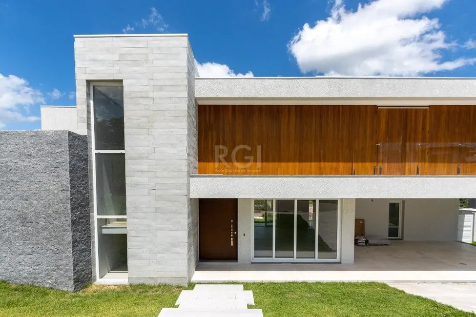 Foto 6 de Casa com 4 quartos à venda, 420m2 em Vila Nova, Porto Alegre - RS