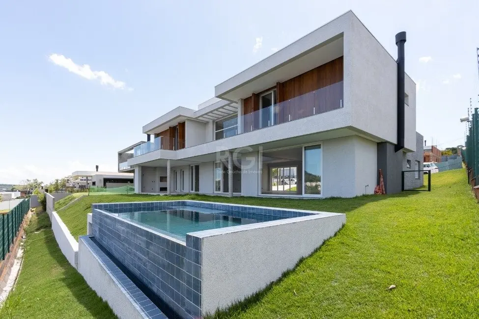 Foto 2 de Casa com 4 quartos à venda, 420m2 em Vila Nova, Porto Alegre - RS