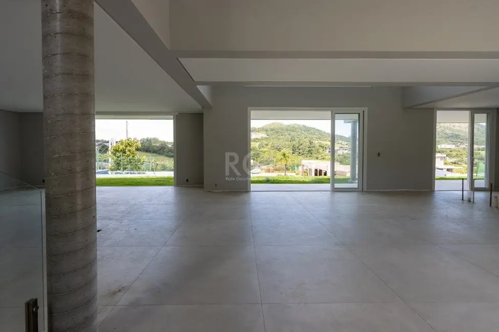 Foto 7 de Casa com 4 quartos à venda, 420m2 em Vila Nova, Porto Alegre - RS