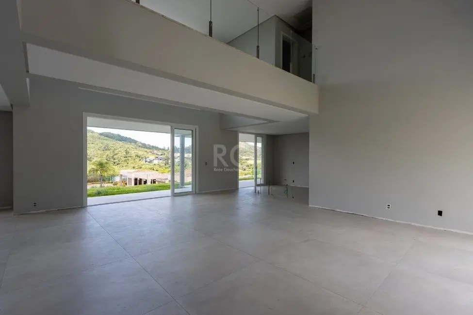 Foto 9 de Casa com 4 quartos à venda, 420m2 em Vila Nova, Porto Alegre - RS