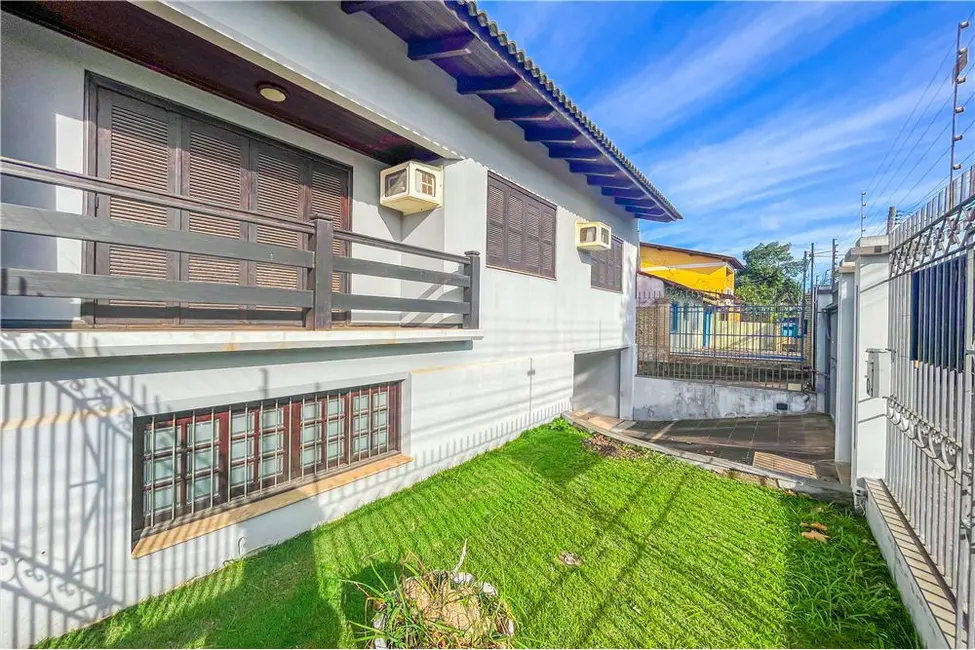 Foto 1 de Casa com 4 quartos à venda, 280m2 em Parque Santa Fé, Porto Alegre - RS