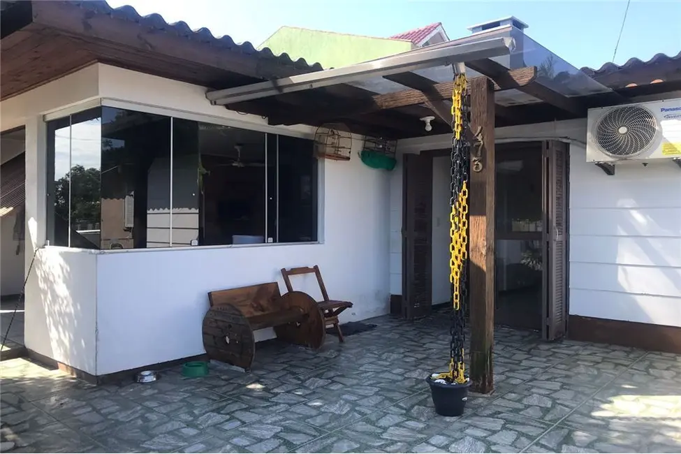 Foto 1 de Casa com 3 quartos à venda, 90m2 em Tramandai - RS