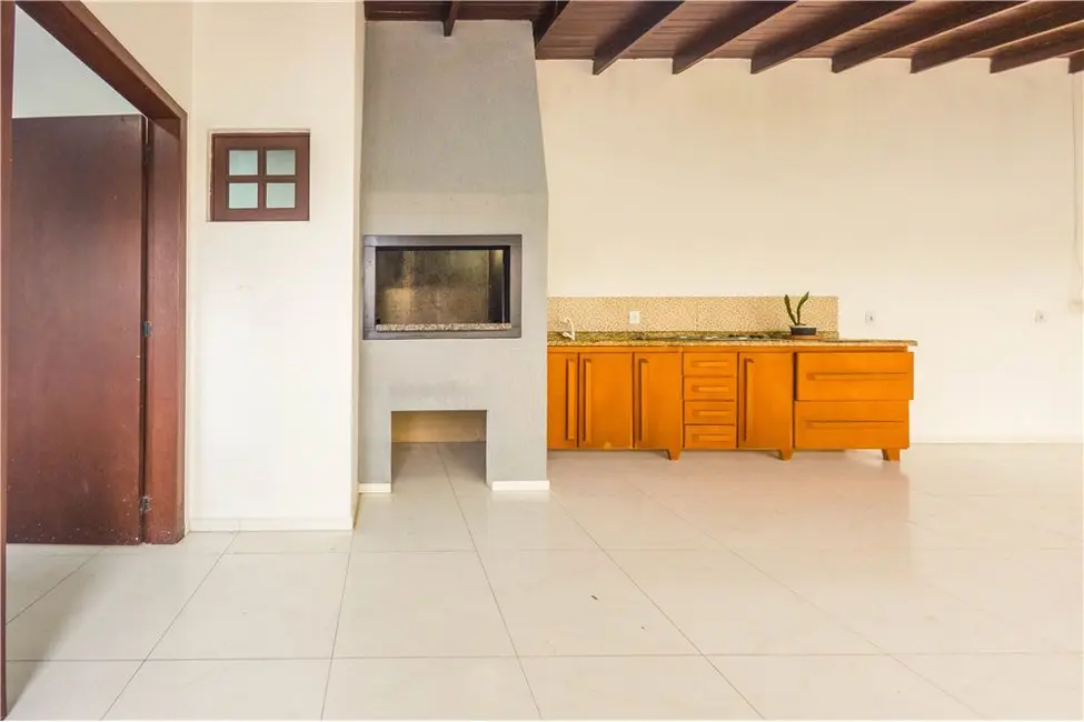 Casa com 3 quartos à venda, 137m2 em Tramandai - RS - imagem 4 Foto 4 de Casa com 3 quartos à venda, 137m2 em Tramandai - RS