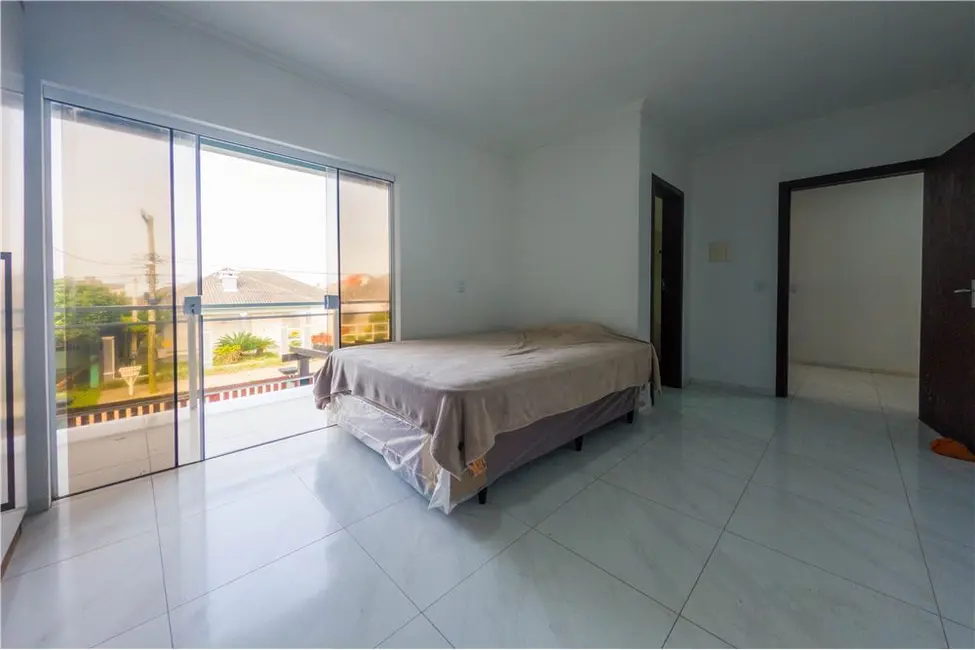 Foto 24 de Casa com 3 quartos à venda, 137m2 em Tramandai - RS