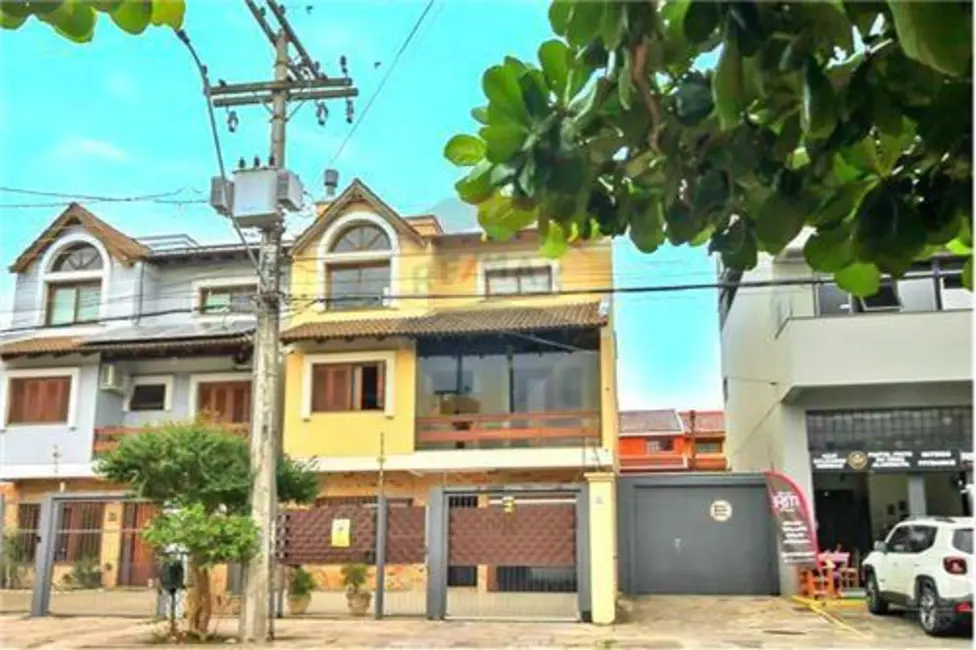 Foto 2 de Casa com 3 quartos à venda, 200m2 em Campo Novo, Porto Alegre - RS