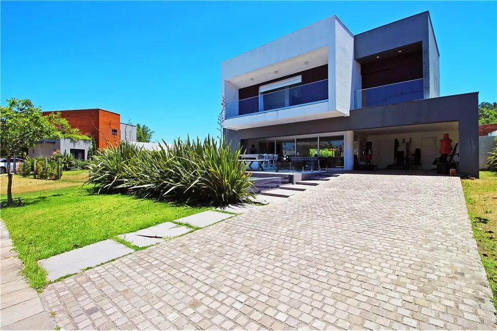 Foto 1 de Casa com 4 quartos à venda, 341m2 em Vila Nova, Porto Alegre - RS