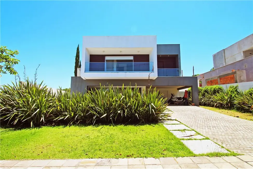 Foto 2 de Casa com 4 quartos à venda, 341m2 em Vila Nova, Porto Alegre - RS