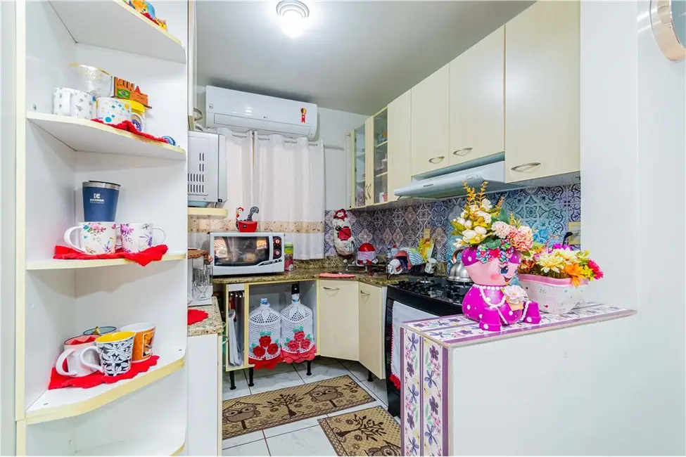 Foto 9 de Casa com 2 quartos à venda, 104m2 em Rio Branco, Canoas - RS