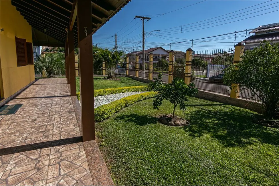 Foto 5 de Casa com 4 quartos à venda, 509m2 em Parque Santa Fé, Porto Alegre - RS