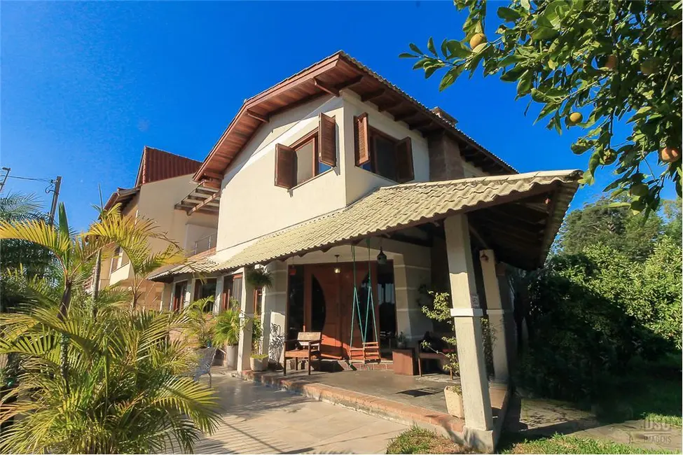 Foto 2 de Casa com 4 quartos à venda, 250m2 em Hípica, Porto Alegre - RS