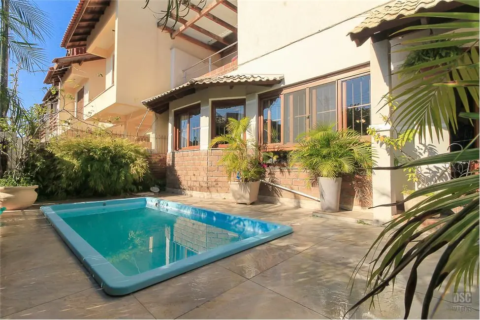 Foto 4 de Casa com 4 quartos à venda, 250m2 em Hípica, Porto Alegre - RS