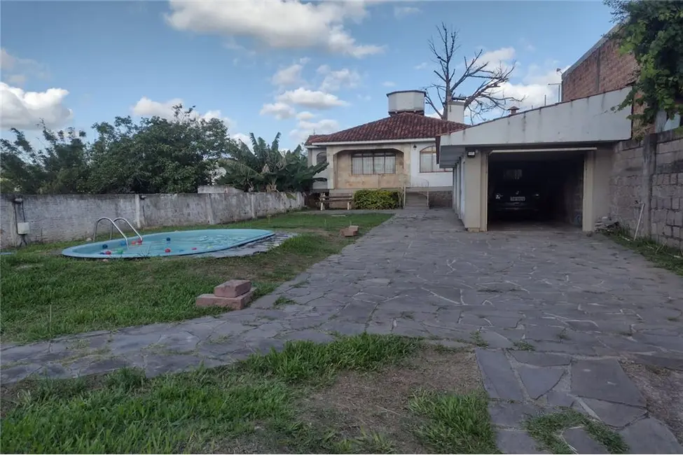 Foto 1 de Casa com 3 quartos à venda, 124m2 em Vila Nova, Porto Alegre - RS