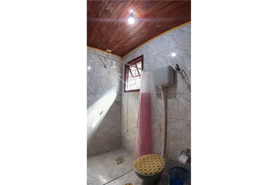 Foto 11 de Casa com 4 quartos à venda, 134m2 em Tramandai - RS