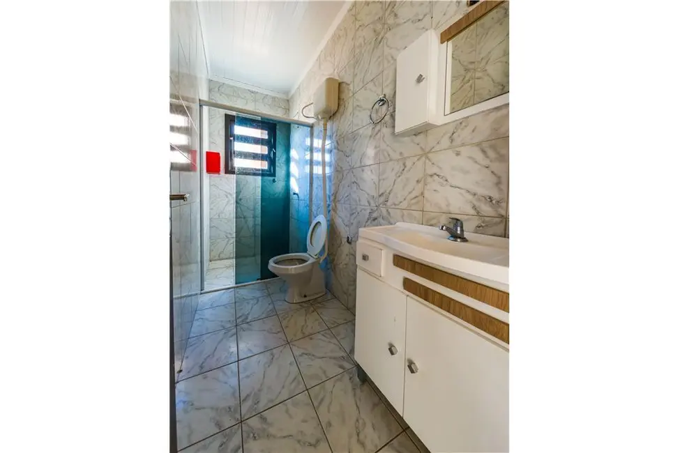 Foto 16 de Casa com 3 quartos à venda, 120m2 em Tramandai - RS