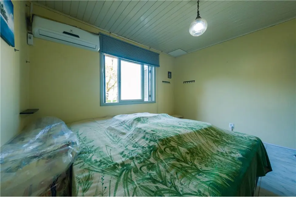 Foto 14 de Casa com 4 quartos à venda, 117m2 em Tramandai - RS