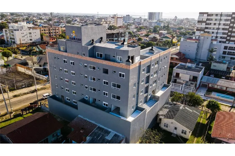 Foto 2 de Apartamento com 2 quartos à venda, 67m2 em Centro, Tramandai - RS