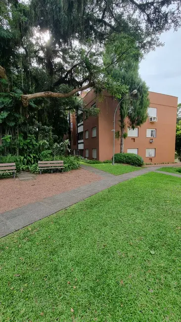 Foto 1 de Apartamento com 2 quartos à venda, 67m2 em Guarujá, Porto Alegre - RS