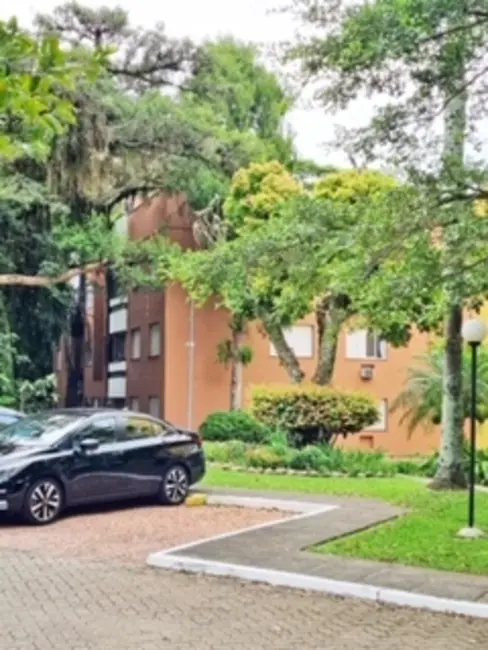 Foto 2 de Apartamento com 2 quartos à venda, 67m2 em Guarujá, Porto Alegre - RS