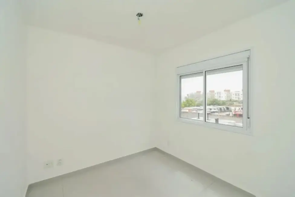 Apartamento com 2 quartos à venda, 50m2 em São José, Porto Alegre - RS - imagem 6 Foto 6 de Apartamento com 2 quartos à venda, 50m2 em São José, Porto Alegre - RS