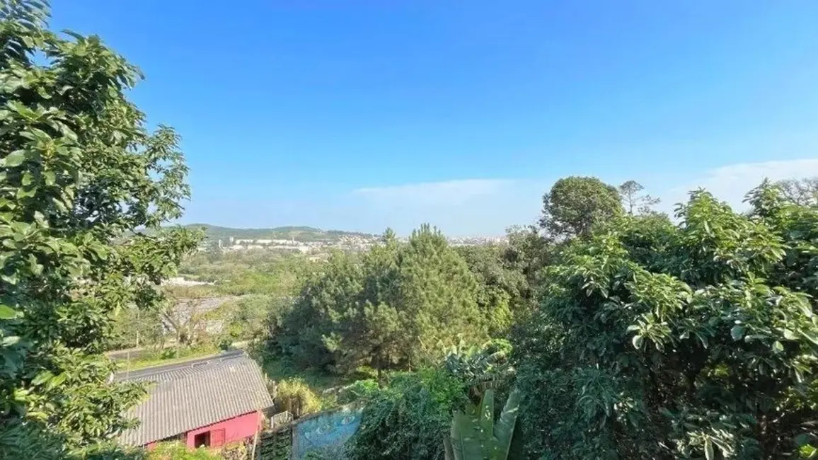 Foto 4 de Casa com 3 quartos à venda, 298m2 em Vila Nova, Porto Alegre - RS